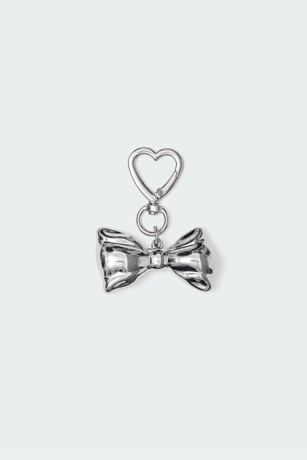 Edikted Metal Bow Bag Charm Silver