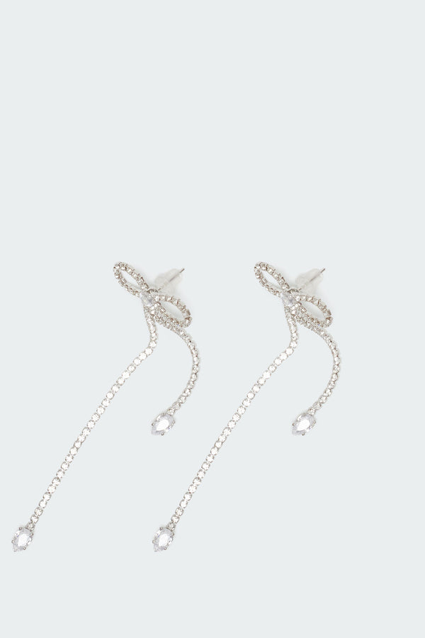Edikted Rhinestone Dangling Bow Earrings Silver